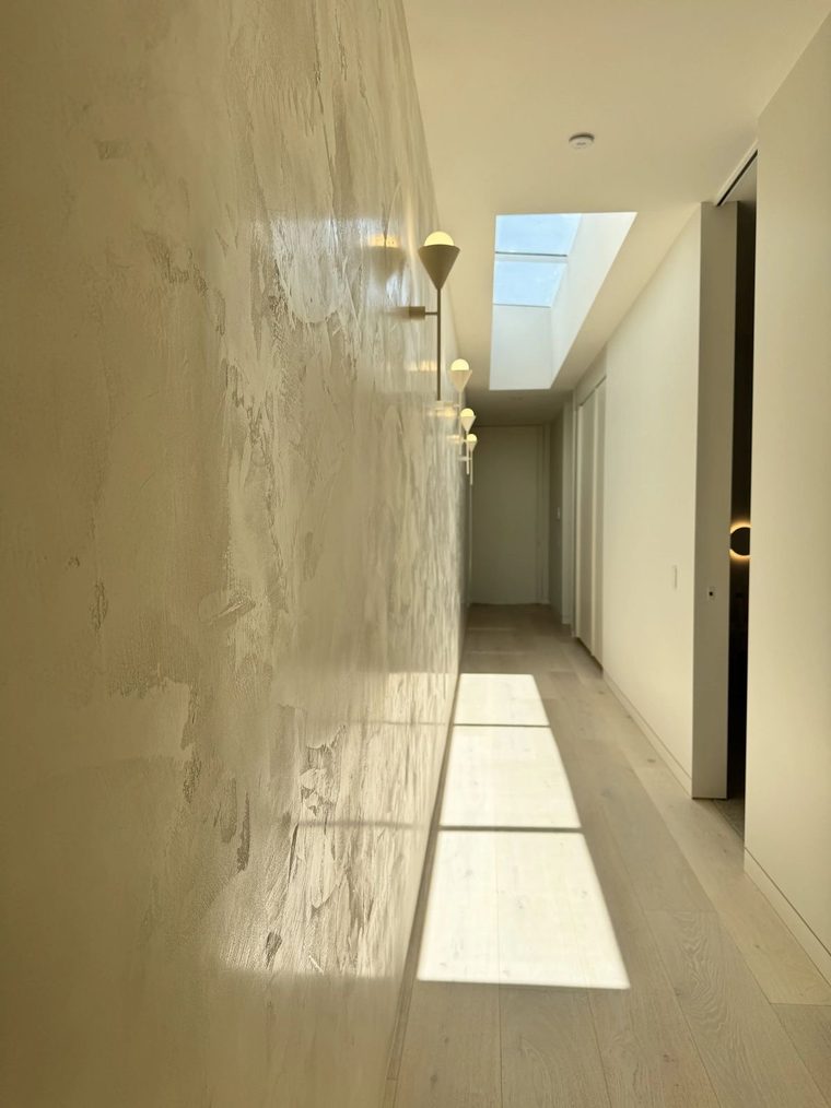 Polished Venetian plaster hallway with a soft sheen